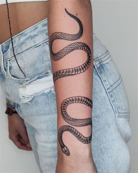 snake wrapped around arm tattoo|Snake Arm Tattoo Ideas for a Fierce Look